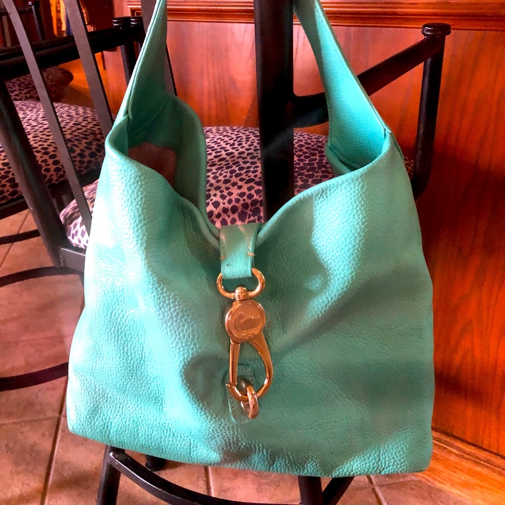 Dooney bourke bucket handbag..beautiful Turquoise color.